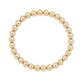 Gouden elastische kralenarmband van gold filled 14K met 6mm kralen, van Bedels & Bedels.