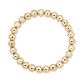 Gouden elastische kralenarmband van gold filled 14K met 7mm kralen, van Bedels & Bedels.