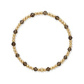 Gouden armband van Bedels & Bedels met gold filled kralen en rookkwarts edelstenen op witte achtergrond
