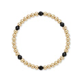 Gouden kralenarmband van gold filled 14K met 4mm zwarte spinel edelstenen, van Bedels & Bedels.