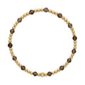 Gouden armband van Bedels & Bedels met gold filled kralen en rookkwarts edelstenen op witte achtergrond