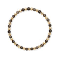 Gold filled armband van Bedels & Bedels met rookkwarts en gouden kralen van 4mm op witte achtergrond