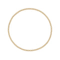 Gouden elastische kralenarmband van gold filled 14K met 2mm kralen, van Bedels & Bedels.