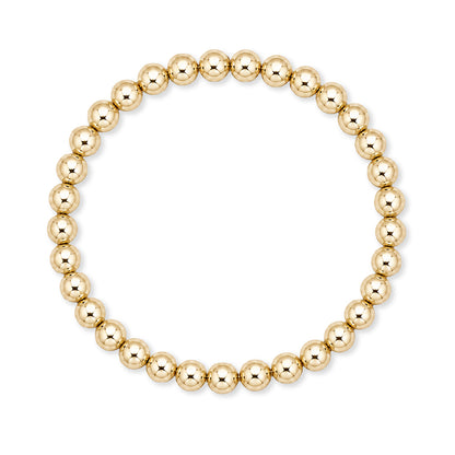 Gouden elastische kralenarmband van gold filled 14K met 5mm kralen, van Bedels & Bedels.