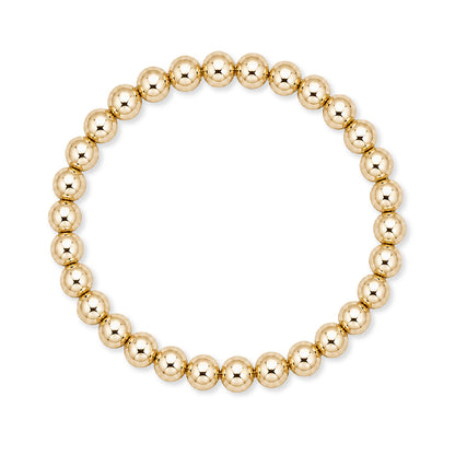 Gouden elastische kralenarmband van gold filled 14K met 6mm kralen, van Bedels & Bedels.