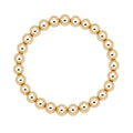 Gouden elastische kralenarmband van gold filled 14K met 7mm kralen, van Bedels & Bedels.