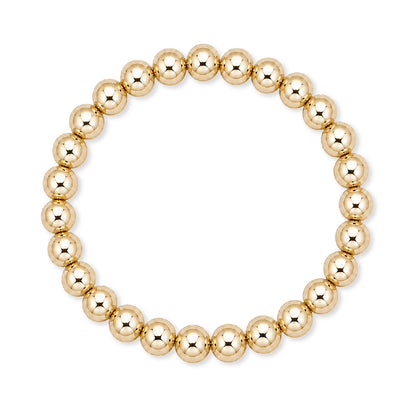 Gouden elastische kralenarmband van gold filled 14K met 7mm kralen, van Bedels & Bedels.