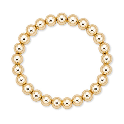 Gouden elastische kralenarmband van gold filled 14K met 8mm kralen, van Bedels & Bedels.