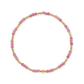 Armband met roze Braziliaanse rhodoniet edelstenen en gouden kralen van gold filled 14K, van Bedels & Bedels.