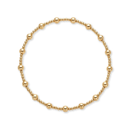 Gouden kralenarmband van gold filled 14K met 4mm kralen en groepjes fijne 2mm kraaltjes, van Bedels & Bedels.