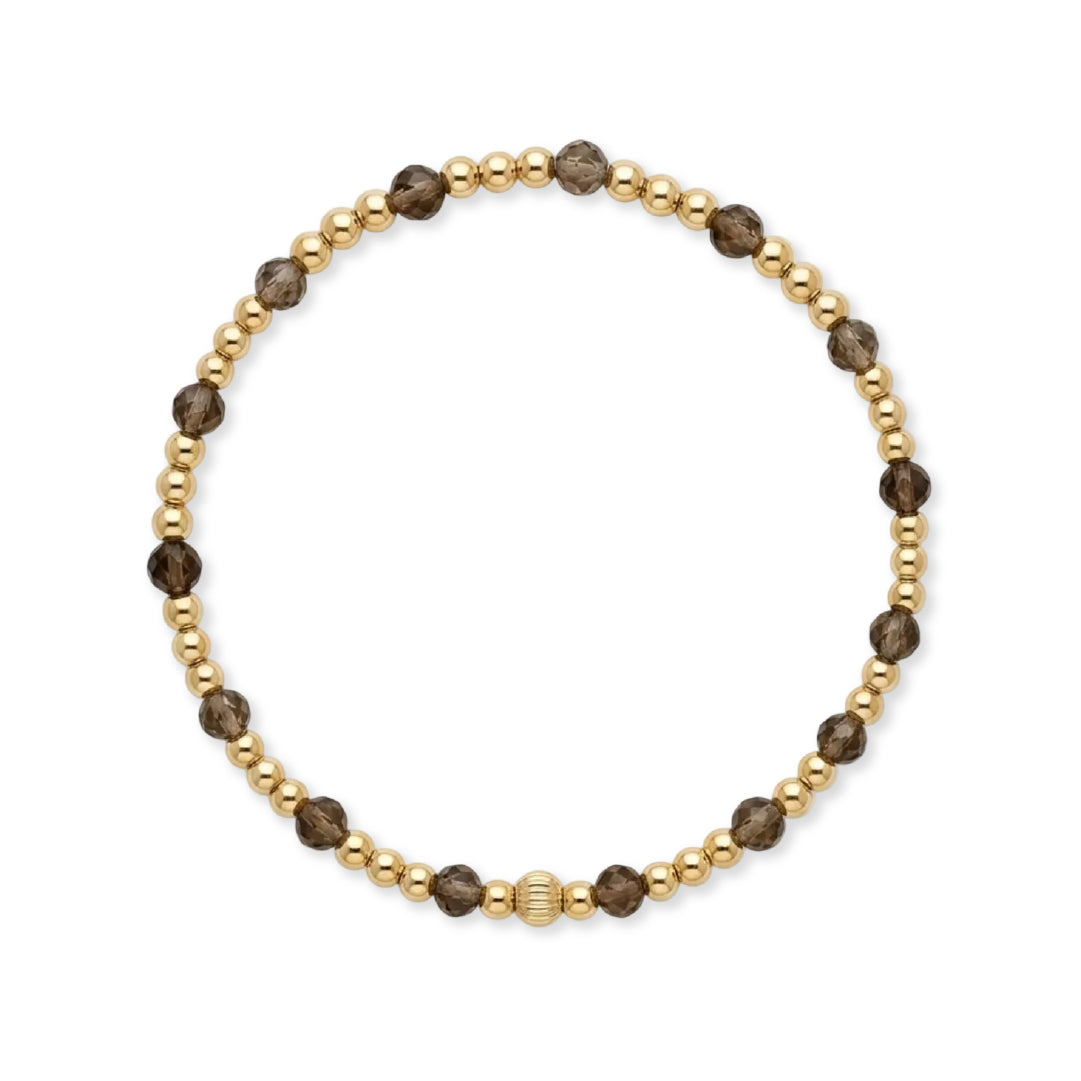 Gouden armband van Bedels & Bedels met gold filled kralen en rookkwarts edelstenen op witte achtergrond