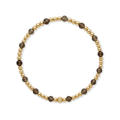 Gouden armband van Bedels & Bedels met gold filled kralen en rookkwarts edelstenen op witte achtergrond