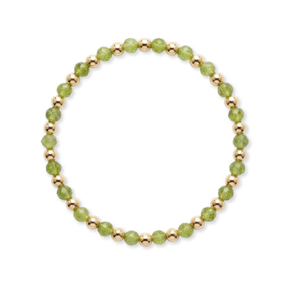 Gouden armband van gold filled 14K met gefacetteerde groene peridoot edelstenen van 4mm, van Bedels & Bedels.