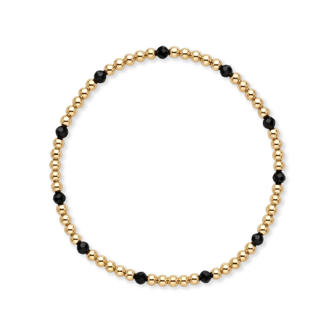 Gouden kralenarmband van gold filled 14K met 3mm zwarte spinel edelstenen, van Bedels & Bedels.