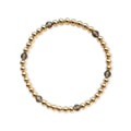 Gouden armband van gold filled 14K met rookgrijze heldere obsidiaan edelstenen van 4mm, van Bedels & Bedels.