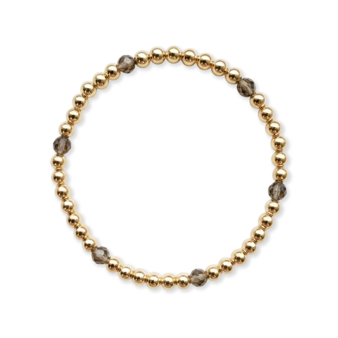 Gouden armband van gold filled 14K met rookgrijze heldere obsidiaan edelstenen van 4mm, van Bedels & Bedels.