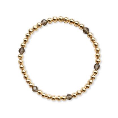 Gouden armband van gold filled 14K met rookgrijze heldere obsidiaan edelstenen van 4mm, van Bedels & Bedels.