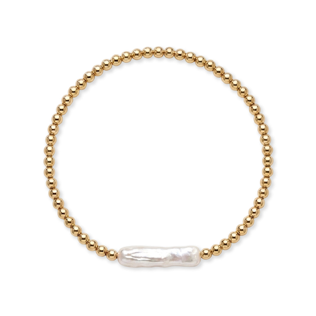 Gouden kralenarmband van gold filled 14K met een staafvormige witte zoetwaterparel, van Bedels & Bedels.
