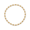 Gouden parelarmband van gold filled 14K met om en om 4mm gouden kralen en witte zoetwaterparels, van Bedels & Bedels.