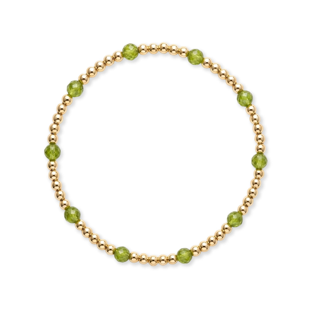 Gouden kralenarmband van gold filled 14K met losse groene peridoot accenten, van Bedels & Bedels.