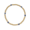 Gouden kralenarmband van gold filled 14K met blauwgrijze iolite edelstenen van 4mm, van Bedels & Bedels.